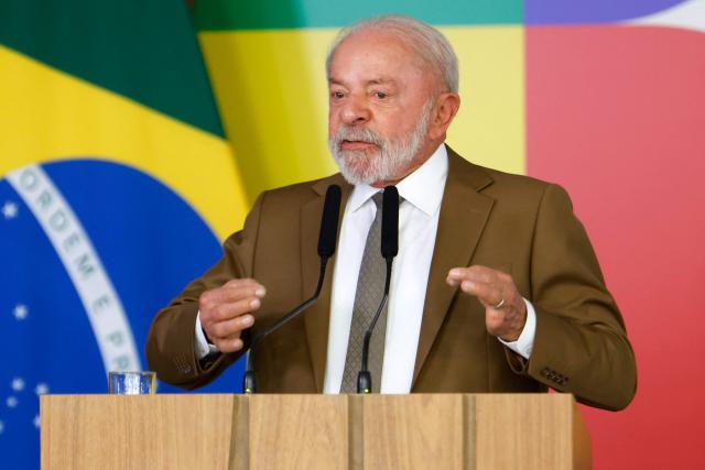 Brazilian President Luiz Inacio Lula da Silva speaks during a press conference to announce measures aimed at mitigating the impact of high oil prices on diesel costs at the Planalto Palace in Brasilia, on March 12, 2026. (Photo by Sergio Lima / AFP)