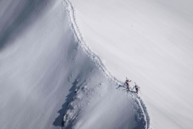 Skiers compete during the second stage of the 40th edition of the Pierra-Menta ski-mountaineering race in Areches-Beaufort, southeastern France on March 12, 2026. (Photo by ARNAUD FINISTRE / AFP)