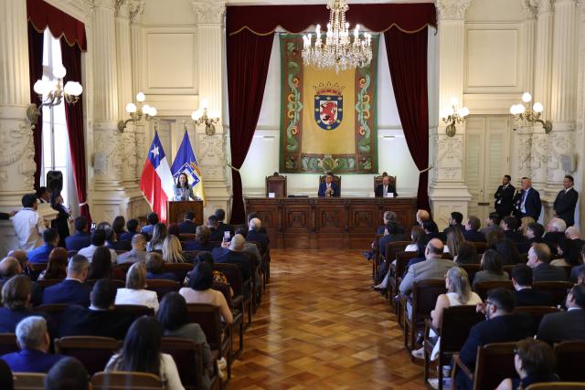 Venezuelan opposition leader Maria Corina Machado (L) delivers a speech after receiving the key to the city at the city hall in Santiago on March 12, 2026. Machado travelled to Chile to attend Chile's President Jose Antonio Kast's inauguration. (Photo by Javier TORRES / AFP)