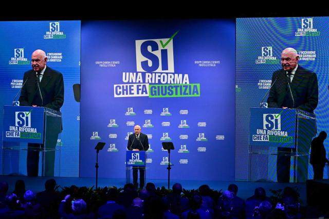 Italy's Justice Minister Carlo Nordio, speaks during a campaign meeting of Italian right wing party Brothers of Italy (Fratelli d'Italia) (Fdi) to support the "Yes" to Justice referendum, in Milan on March 12, 2026. (Photo by Stefano RELLANDINI / AFP)