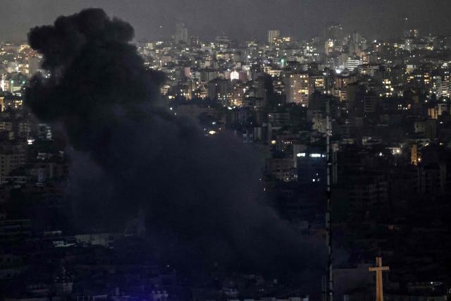 Smoke rises from the site of an Israeli airstrike that targeted an area in Beirut’s southern suburbs on March 12, 2026. Lebanon said an Israeli strike on central Beirut's seafront killed at least seven people early on March 12, another attack in the heart of the capital as Iran-backed Hezbollah launched more missiles at Israel. The Israeli military said separately it had carried out strikes on Beirut's southern suburbs overnight against Hezbollah, which had announced a major new operation against Israel. (Photo by IBRAHIM AMRO / AFP) / 