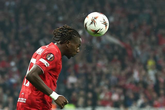 Lille's Congolese midfielder #17 Ngal'Ayel Mukau heads the ball during the UEFA Europa League round of 16 first leg football match between Lille (LOSC) and Aston Villa  at the Pierre-Mauroy Stadium in Villeneuve-d'Ascq, northern France, on March 12, 2026. (Photo by Sameer AL-DOUMY / AFP)