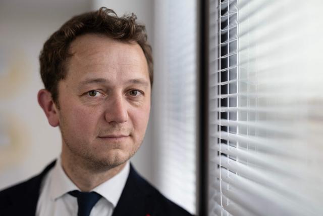 French President of the Departemental Council of Finistere Mael de Calan poses during a photo session in Brest, western France on March 12, 2026. Accused of harassing beneficiaries, the president of the Finistère Department said on March 12, 2026 that he was "proud" to have "brought thousands of people back to work" as part of his RSA plan that he intends to carry out at the national level. (Photo by Fred TANNEAU / AFP)