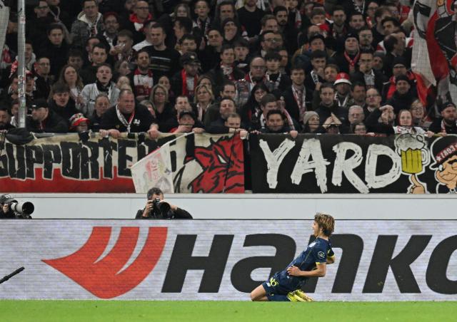 FC Porto's Portuguese midfielder #86 Rodrigo Mora celebrates his 0-2 during the UEFA Europa League - Last 16 - first leg football match VfB Stuttgart v FC Porto in Stuttgart, southern Germany, on March 12, 2026. (Photo by THOMAS KIENZLE / AFP)