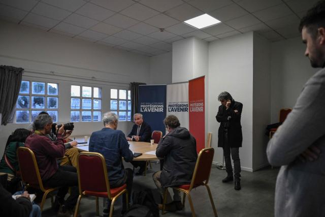 Toulouse outgoing mayor and candidate to succession Jean-Luc Moudenc attends a press conference prior to a campaign meeting in Toulouse on March 12, 2026, three days ahead of the first round of France's municipal elections. French voters head to the polls for municipal elections on March 15 and 22, 2026. (Photo by Ed JONES / AFP)