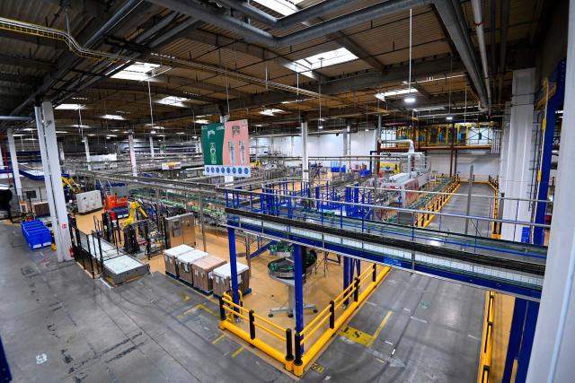 This photograph shows the production line of Perrier's natural sparkling mineral water factory in Vergeze, southern France on March 12, 2026. (Photo by Sylvain THOMAS / AFP)