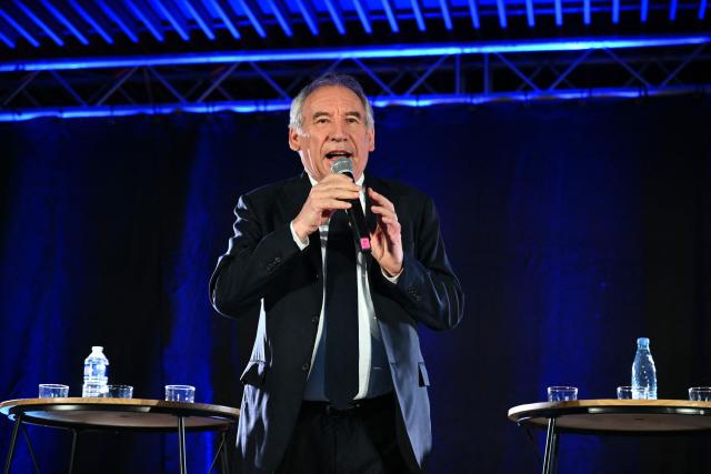 Outgoing Mayor of Pau and Modem (Mouvement democrate - Democratic Movement) candidate for re-election Francois Bayrou addresses the audience during a campaign rally in Pau, southwestern France on March 12, 2026, ahead of France's municipal elections. French voters are scheduled to head to the polls for municipal elections on March 15 and March 22, 2026. (Photo by GAIZKA IROZ / AFP)