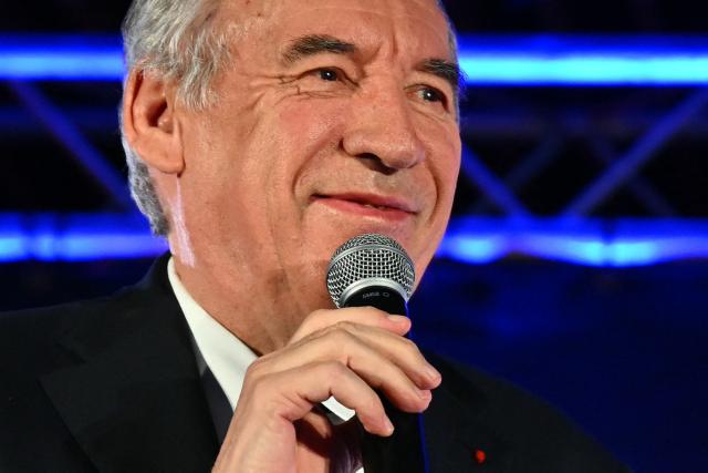 Outgoing Mayor of Pau and Modem (Mouvement democrate - Democratic Movement) candidate for re-election Francois Bayrou addresses the audience during a campaign rally in Pau, southwestern France on March 12, 2026, ahead of France's municipal elections. French voters are scheduled to head to the polls for municipal elections on March 15 and March 22, 2026. (Photo by GAIZKA IROZ / AFP)