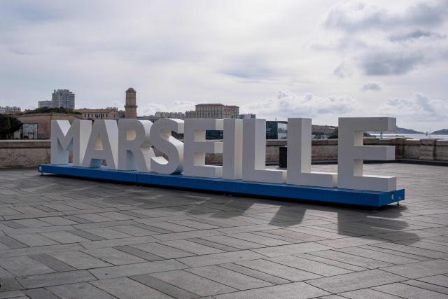 This photograph shows a "Marseille" sign near the Cathedral of Sainte-Marie-Majeure in Marseille, southern France, on March 11, 2026. (Photo by Elodie CLEMENT / AFP)