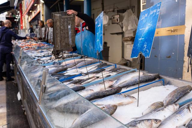 This photograph shows a fish stall at a market in the Noailles neighbourhood of Marseille, southern France, on March 12, 2026. (Photo by Elodie CLEMENT / AFP)