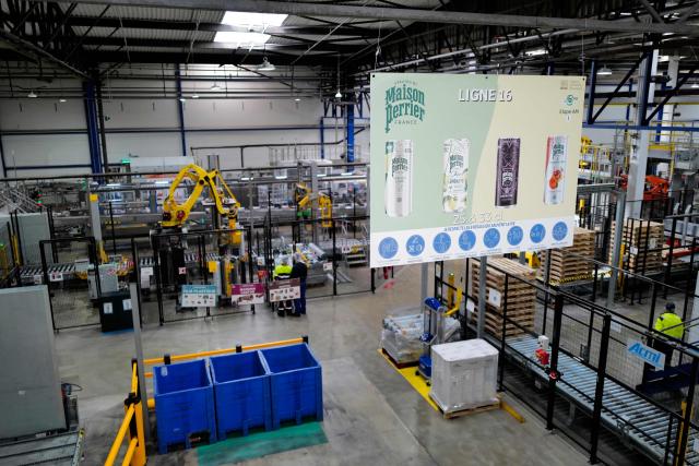 This photograph shows the production line of the Maison Perrier brand at Perrier's sparkling mineral water factory in Vergeze, southern France, on March 12, 2026. (Photo by Sylvain THOMAS / AFP)