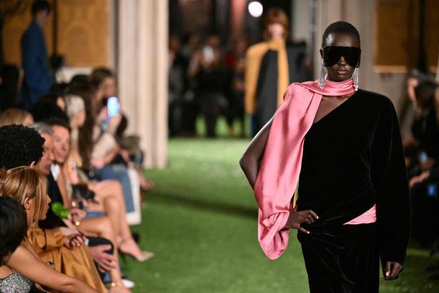 A model presents a creation by Italian fashion house Valentino during the show "Interferenze" Fall/Winter 2026-2027 collection at Palazzo Barberini in Rome on March 12, 2026. Italian fashion house Valentino returns to its roots with a catwalk show designed by creative director Alessandro Michele in one of Rome's most spectacular venues, two months after the death of founder Valentino Garavani. (Photo by Alberto PIZZOLI / AFP)