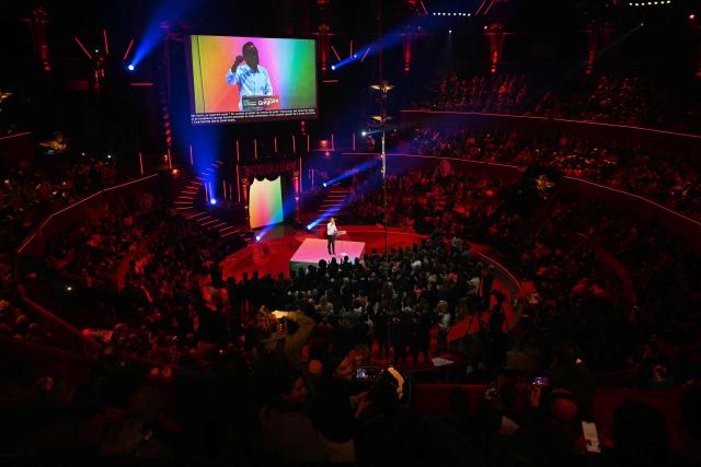 Socialistes et Apparentes' MP and Paris' mayoral candidate Emmanuel Gregoire addresses the audience during a campaign meeting outside the Cirque d'Hiver in Paris on March 12, 2026, ahead of France's municipal elections. French voters are scheduled to head to the polls for municipal elections on March 15 and March 22, 2026. (Photo by Martin LELIEVRE / AFP)