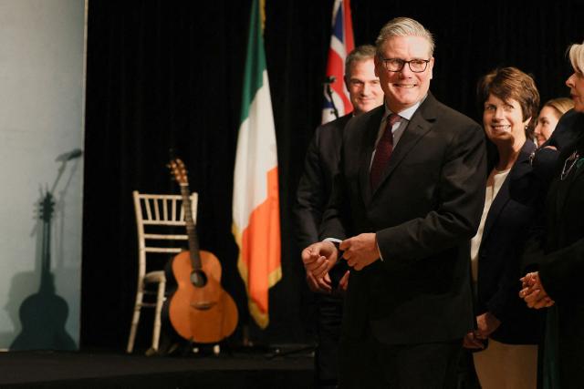 Britain's Prime Minister Keir Starmer reacts as he prepares to deliver remarks at a civic and cultural reception at City in Cork, Ireland, on March 12, 2026, as part of a two-day UK-Ireland summit. (Photo by Cathal McNaughton / POOL / AFP)