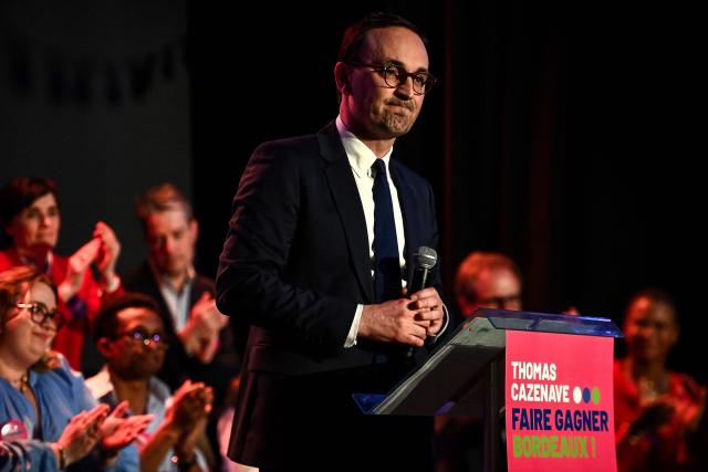 French liberal party Renaissance candidate running as Bordeaux mayor Thomas Cazenave delivers a speech during a campaign meeting in Bordeaux on March 12, 2026, three days ahead of the first round of the municipal elections in France. (Photo by Christophe ARCHAMBAULT / AFP)