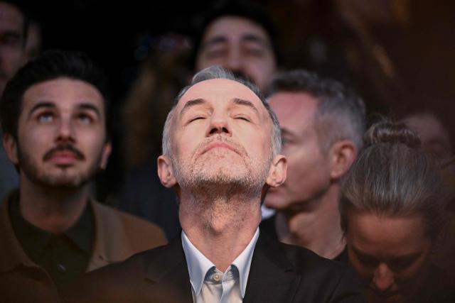 Socialistes et Apparentes' MP and Paris' mayoral candidate Emmanuel Gregoire looks on during a campaign meeting at the Cirque d'Hiver in Paris on March 12, 2026, ahead of France's municipal elections. French voters are scheduled to head to the polls for municipal elections on March 15 and March 22, 2026. (Photo by Martin LELIEVRE / AFP)