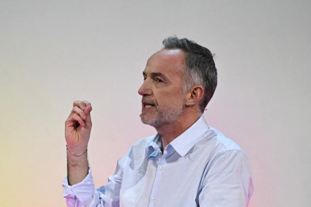 Socialistes et Apparentes' MP and Paris' mayoral candidate Emmanuel Gregoire addresses the audience during a campaign meeting at the Cirque d'Hiver in Paris on March 12, 2026, ahead of France's municipal elections. French voters are scheduled to head to the polls for municipal elections on March 15 and March 22, 2026. (Photo by Martin LELIEVRE / AFP)