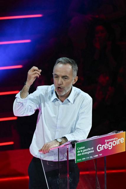 Socialistes et Apparentes' MP and Paris' mayoral candidate Emmanuel Gregoire addresses the audience during a campaign meeting at the Cirque d'Hiver in Paris on March 12, 2026, ahead of France's municipal elections. French voters are scheduled to head to the polls for municipal elections on March 15 and March 22, 2026. (Photo by Martin LELIEVRE / AFP)