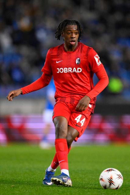 SC Freiburg's Swiss midfielder #44 Johan Manzambi passes the ball during the UEFA Europa League last 16 first leg football match between KRC Genk and SC Freiburg at the Fenix Stadium in Genk on March 12, 2026. Freiburg's Johan Manzambi (Photo by JOHN THYS / AFP)