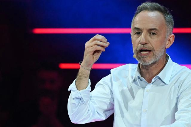 Socialistes et Apparentes' MP and Paris' mayoral candidate Emmanuel Gregoire addresses the audience during a campaign meeting at the Cirque d'Hiver in Paris on March 12, 2026, ahead of France's municipal elections. French voters are scheduled to head to the polls for municipal elections on March 15 and March 22, 2026. (Photo by Martin LELIEVRE / AFP)