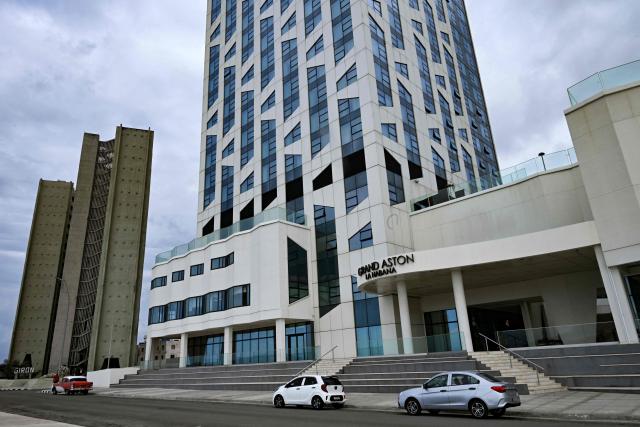 View of the Grand Aston La Habana hotel in Havana on March 12, 2026. (Photo by YAMIL LAGE / AFP)