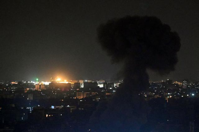 Smoke rises from the site of an Israeli airstrike that targeted an area in Beirut's southern suburbs, Lebanon, on March 13, 2026. Israel continued striking Beirut as it threatened to expand operations and seize territory in Lebanon if militant group Hezbollah did not stop its attacks. (Photo by FADEL itani / AFP) / 