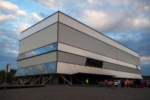 The facade of the Bio-Bio Theater, designed by Chilean architect Smiljan Radic, is pictured in Concepcion, Chile, on March 12, 2026. On March 12, the Pritzker Prize, the world's highest award in architecture, was awarded to Chilean Smiljan Radic Clarke, known especially for his use of natural materials, the Chicago-based organization announced. (Photo by Lukas Jara / AFP)