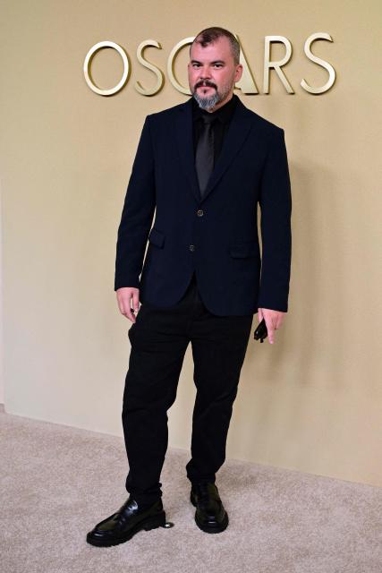 (FILES) Brazilian screenwriter and casting director Gabriel Domingues, nominee in Best Ensemble/Casting category for "The Secret Agent", attends the 98th Oscars Nominees Luncheon at the Beverly Hilton hotel in Beverly Hills, California on February 10, 2026. When a film stays with you, it is often because of the magical chemistry among the actors. You can thank casting directors for that, and finally, the Academy is honoring them too. After nearly a century of handing out golden statuettes, the Academy on March 15 will hand out its first Oscars to the professionals -- often women -- who create the perfect alchemy on set. (Photo by Frederic J. Brown / AFP)