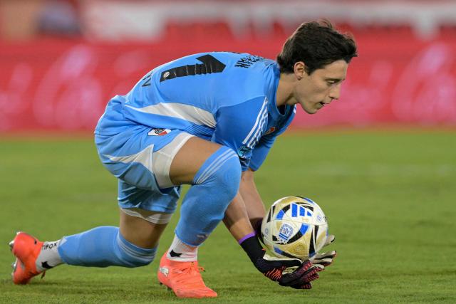 River Plate's goalkeeper #41 Santiago Beltran grabs the ball during the Argentine Professional Football League 2026 Apertura Tournament match between Huracan and River Plate at the Tomas Adolfo Duco Stadium in Buenos Aires on March 12, 2026. (Photo by JUAN MABROMATA / AFP)