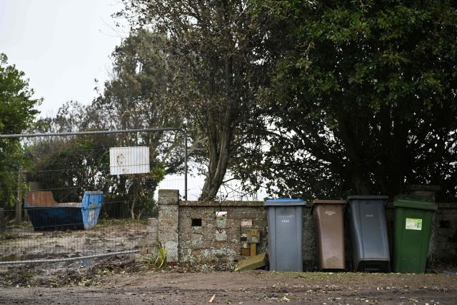 This photo taken on February 3, 2026 shows a general view of the area following the demolition of a property on the coastline of Thorpeness, Suffolk. In an English seaside village, researchers discuss options for relocating a graveyard threatened with slipping into the sea, or moving back a car park perilously close to a cliff edge. The team from the Coastwise project have been granted over 15 million pounds (20 million USD) in government funding to adapt the coastline in North Norfolk, eastern England, to accelerating erosion worsened by climate change. (Photo by Ben STANSALL / AFP) / TO GO WITH Britain-climate-environment,FOCUS by Akshata KAPOOR