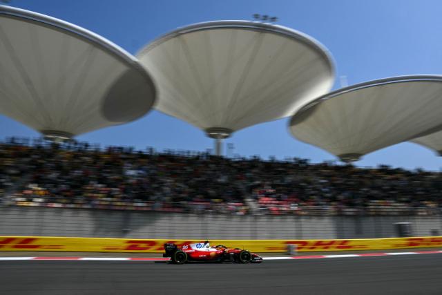 Ferrari's Monegasque driver Charles Leclerc drives during a practice session ahead of the Formula One Chinese Grand Prix at the Shanghai International Circuit in Shanghai on March 13, 2026. (Photo by GREG BAKER / AFP)