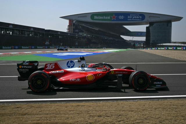 Ferrari's Monegasque driver Charles Leclerc drives during a practice session ahead of the Formula One Chinese Grand Prix at the Shanghai International Circuit in Shanghai on March 13, 2026. (Photo by GREG BAKER / AFP)