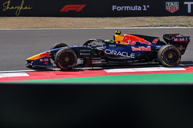 Red Bull Racing's French driver Isack Hadjar drives during a practice session ahead of the Formula One Chinese Grand Prix at the Shanghai International Circuit in Shanghai on March 13, 2026. (Photo by Jade Gao / AFP)