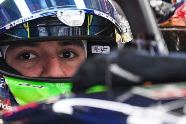 Red Bull Racing's French driver Isack Hadjar prepares before a practice session ahead of the Formula One Chinese Grand Prix at the Shanghai International Circuit in Shanghai on March 13, 2026. (Photo by Hector RETAMAL / AFP)