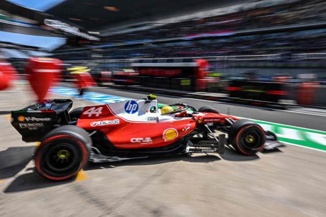 Ferrari's British driver Lewis Hamilton drives out of the pit lane during a practice session ahead of the Formula One Chinese Grand Prix at the Shanghai International Circuit in Shanghai on March 13, 2026. (Photo by Hector RETAMAL / AFP)