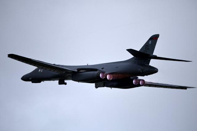A US Air Force B-1 Lancer bomber takes off from RAF Fairford in south-west England on March 13, 2026. Fairford is one of two bases, along with the Diego Garcia facility in the Indian Ocean, that the UK has given the US permission to use for "specific defensive operations into Iran" to destroy Iranian missiles at source, the British defence minister said in a statement. (Photo by Henry NICHOLLS / AFP)