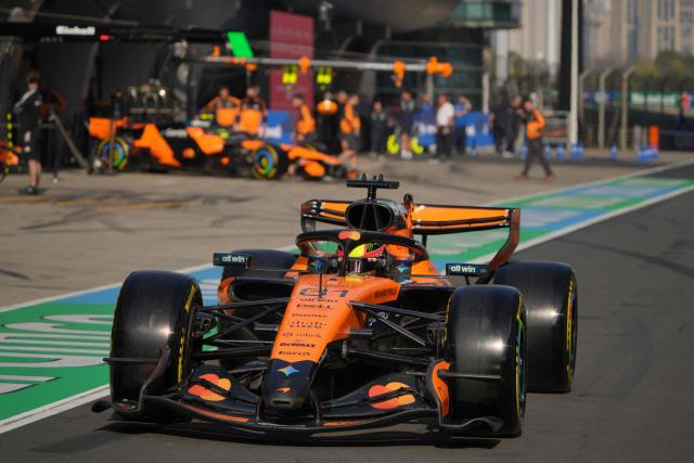 McLaren's Australian driver Oscar Piastri drives in the pit lane during the sprint qualifying session ahead of the Formula One Chinese Grand Prix at the Shanghai International Circuit in Shanghai on March 13, 2026. (Photo by Andy WONG / POOL / AFP)