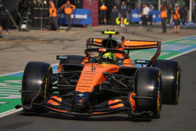 McLaren's British driver Lando Norris drives in the pit lane during the sprint qualifying session ahead of the Formula One Chinese Grand Prix at the Shanghai International Circuit in Shanghai on March 13, 2026. (Photo by Andy WONG / POOL / AFP)