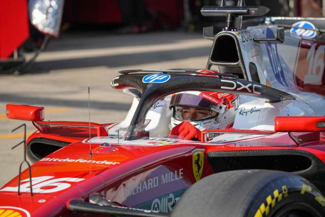 Ferrari's Monegasque driver Charles Leclerc drives in the pits during the sprint qualifying session ahead of the Formula One Chinese Grand Prix at the Shanghai International Circuit in Shanghai on March 13, 2026. (Photo by Andy WONG / POOL / AFP)