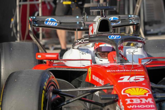 Ferrari's Monegasque driver Charles Leclerc drives in the pits during the sprint qualifying session ahead of the Formula One Chinese Grand Prix at the Shanghai International Circuit in Shanghai on March 13, 2026. (Photo by Andy WONG / POOL / AFP)