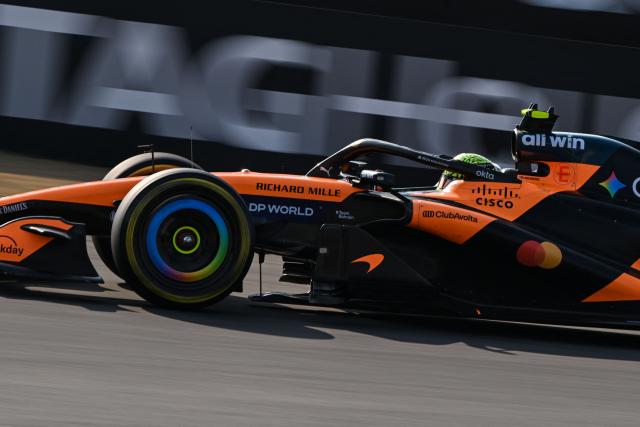 McLaren's British driver Lando Norris drives during the sprint qualifying session ahead of the Formula One Chinese Grand Prix at the Shanghai International Circuit in Shanghai on March 13, 2026. (Photo by Hector RETAMAL / AFP)