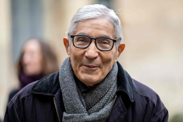 (FILES) French-Algerian writer Boualem Sansal arrives to attend the ceremony of the Cino del Duca Award at the Academie Francaise (French Academy), in Paris on December 4, 2025. French-Algerian writer Boualem Sansal, released in November 2025 after a year in detention in Algeria, is going to join Grasset, the publishing house of the Hachette Livre giant, the group’s CEO Arnaud Lagardиre announced on March 13, 2026. (Photo by BERTRAND GUAY / AFP)