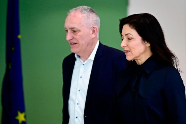 German Economy and Energy Minister Katherina Reiche and Juergen Kerner, member of the Executive Board and second Chairman of IG Metall, arrive to address journalists in a joint press statement in Berlin on March 13, 2026, on the occasion of a high-level meeting of the 'Alliance for the Future of Industry' (Buendnis Zukunft der Industrie). (Photo by Tobias SCHWARZ / AFP)