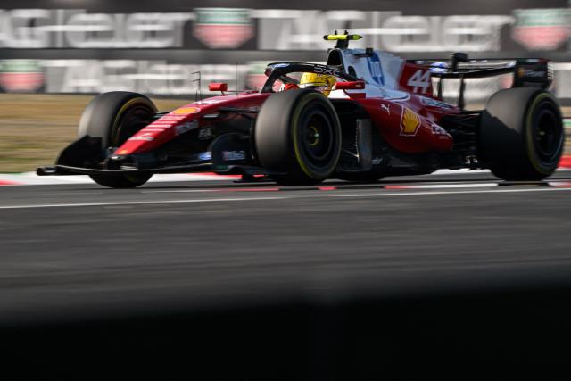 Ferrari's British driver Lewis Hamilton drives during the sprint qualifying session ahead of the Formula One Chinese Grand Prix at the Shanghai International Circuit in Shanghai on March 13, 2026. (Photo by Hector RETAMAL / AFP)