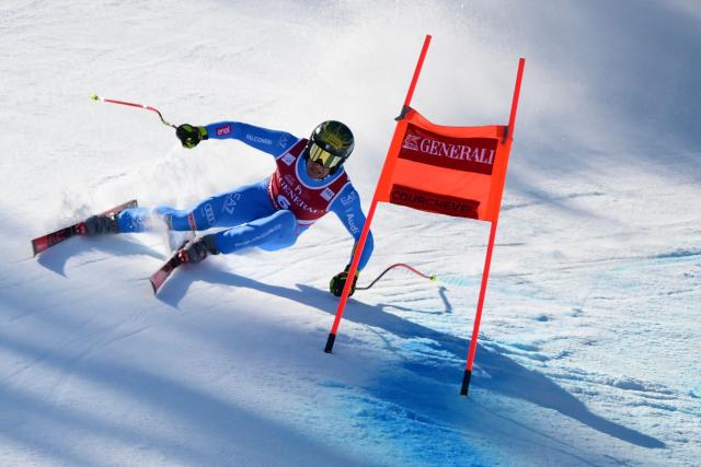 Italy's Giovanni Franzoni competes in the Men's Downhill event of the FIS Alpine World Cup in Courchevel in the French Alps on March 13, 2026. (Photo by Olivier CHASSIGNOLE / AFP)
