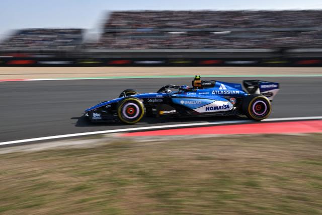 Williams' Spanish driver Carlos Sainz drives during the sprint qualifying session ahead of the Formula One Chinese Grand Prix at the Shanghai International Circuit in Shanghai on March 13, 2026. (Photo by Hector RETAMAL / AFP)