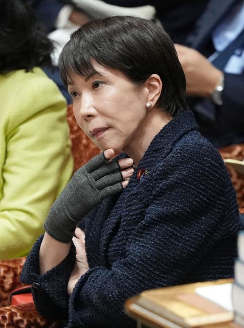 Japan's Prime Minister Sanae Takaichi listens to questions during a budget committee session of the House of Representatives at Parliament in Tokyo on March 13, 2026. (Photo by JIJI PRESS / AFP) / Japan OUT