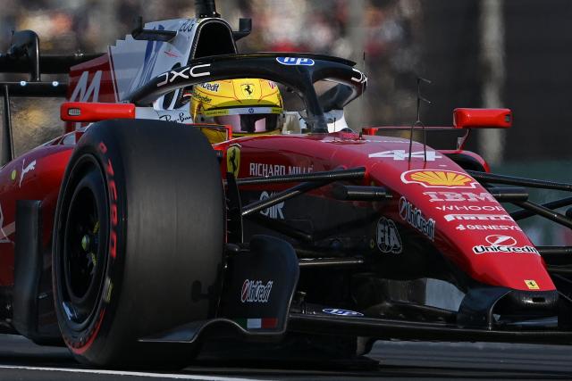 Ferrari's British driver Lewis Hamilton drives during the sprint qualifying session ahead of the Formula One Chinese Grand Prix at the Shanghai International Circuit in Shanghai on March 13, 2026. (Photo by GREG BAKER / AFP)