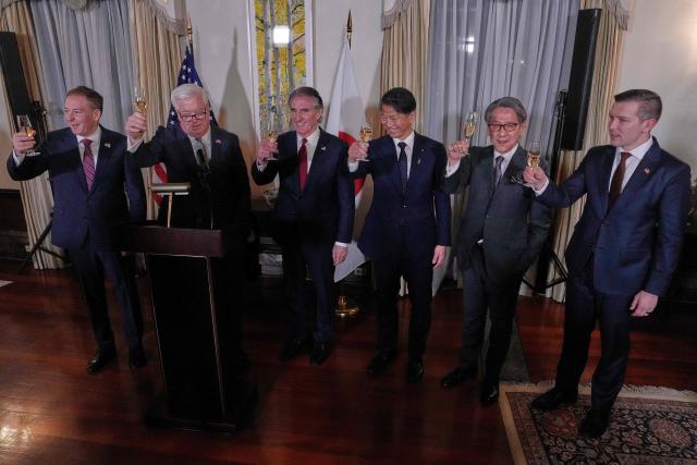 (From left) Lee Zeldin, Environmental Protection Agency Administrator, George Glass, US Ambassador to Japan Doug Burgum, Secretary of Interior, Japan's Vice Minister of Economy, Trade and Industry Kenji Yamada, Tadashi Maeda, chairman of Japan Bank for International Cooperation, and Kyle Haustveit, Assistant Secretary of Energy, make a toast at the reception of the Indo-Pacific Energy Security Ministerial and Business Forum at the US ambassador's residence in Tokyo March 13, 2026. (Photo by Eugene Hoshiko / POOL / AFP)