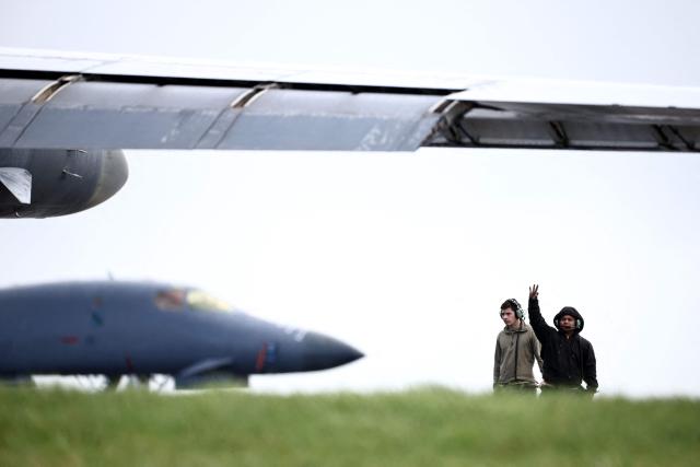 A US Air Force B-1 Lancer bombers carrying Joint Direct Attack Munitions (JDAM) are prepared for take off, from RAF Fairford in south-west England on March 13, 2026. Fairford is one of two bases, along with the Diego Garcia facility in the Indian Ocean, that the UK has given the US permission to use for "specific defensive operations into Iran" to destroy Iranian missiles at source, the British defence minister said in a statement. (Photo by Henry NICHOLLS / AFP)